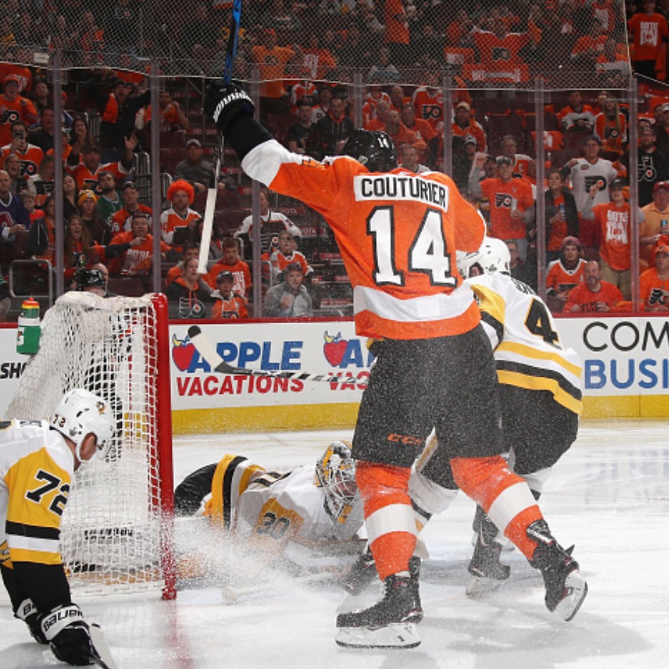 Sean Couturier hyping up the crowd at the Wells Fargo Center after scoring a goal.